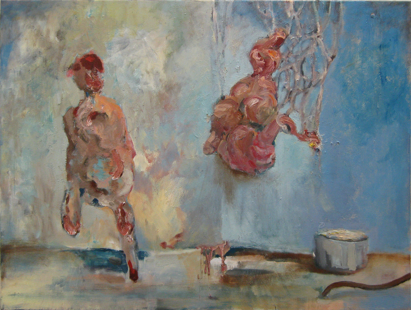 Two abject figures in a cellar with a bucket